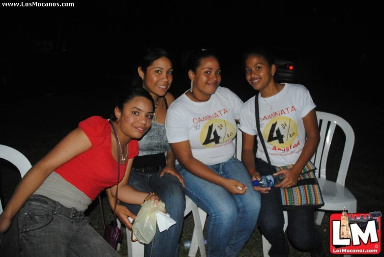 the women are posing for a picture together