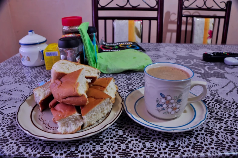 the sandwich is on the plate and ready to be eaten