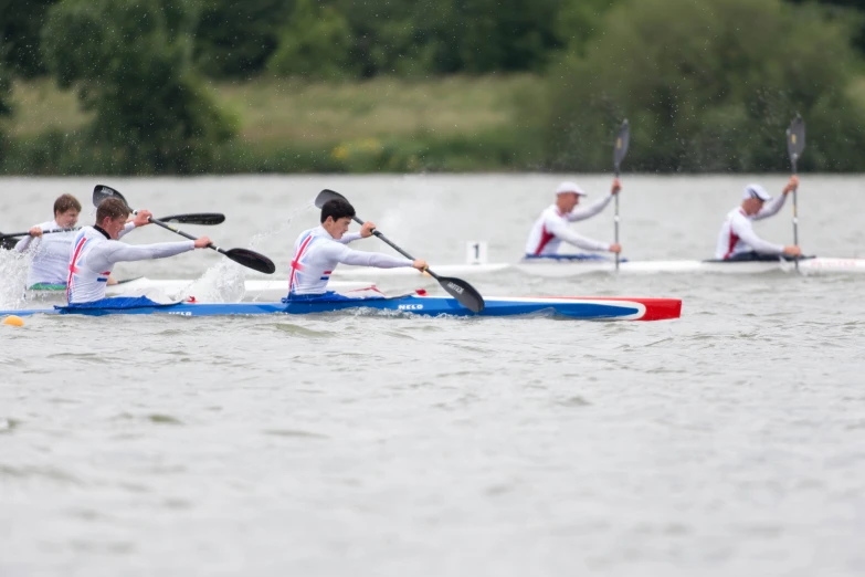 there are six people in the water on their kayaks