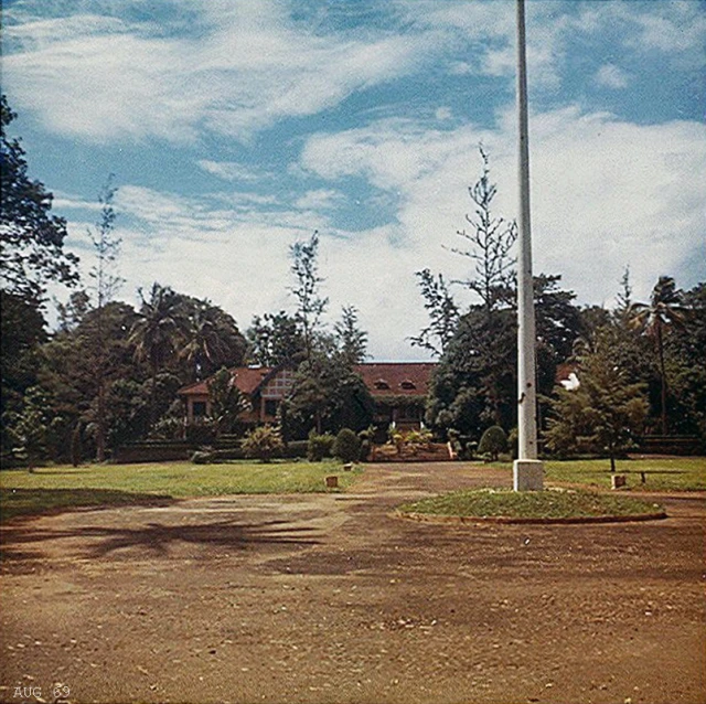 the flag pole stands tall in a vacant area