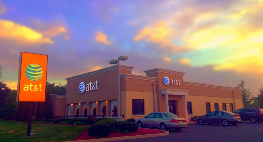 the exterior of a retail store at dusk