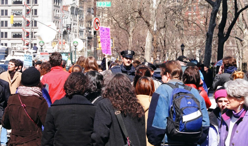 a crowd of people on a city street