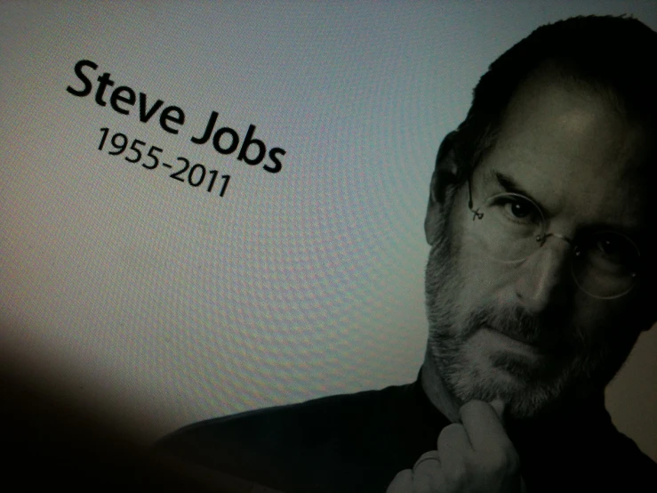 steve jobs is on the screen of a television