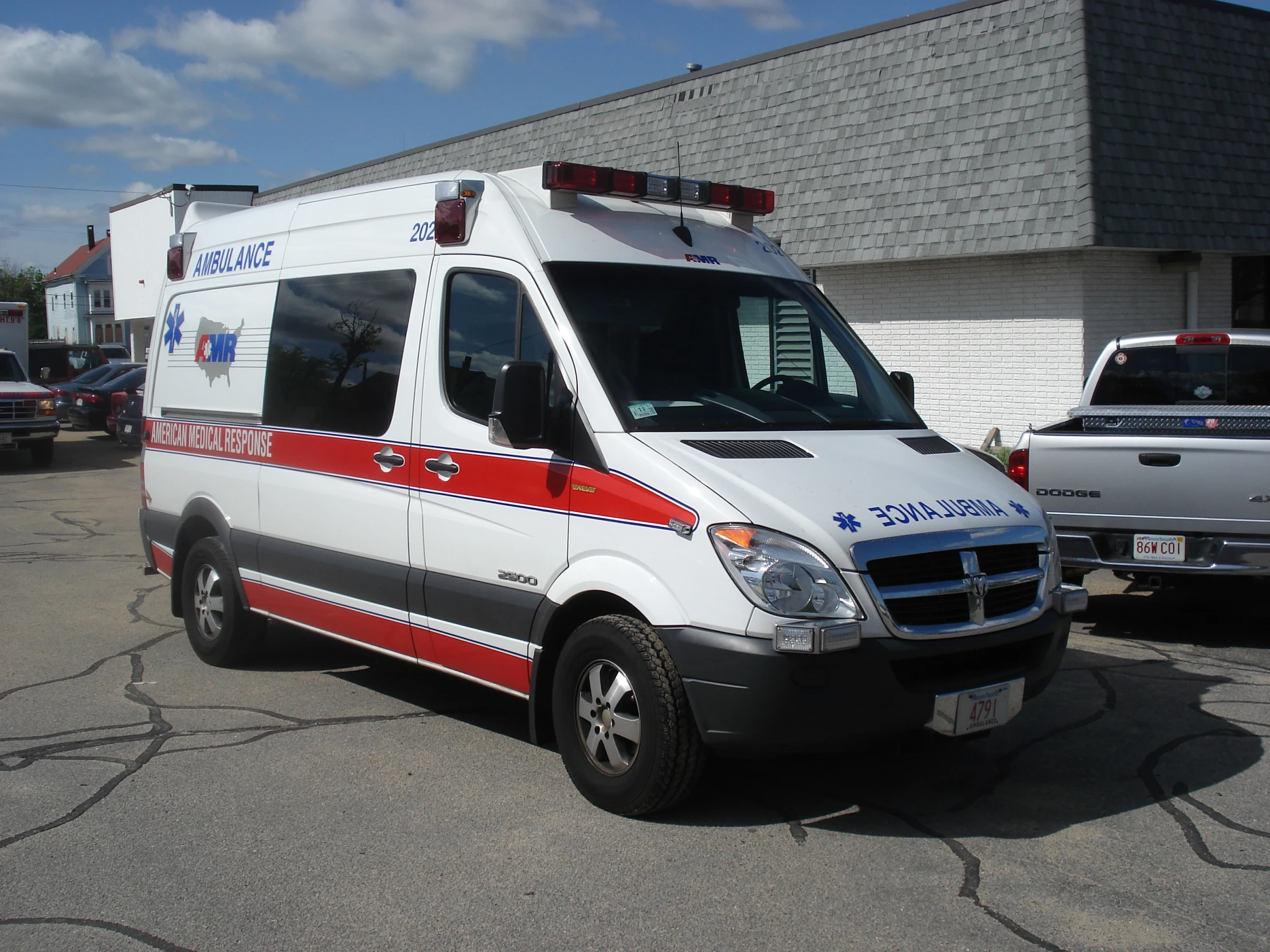 an ambulance van parked in a parking lot