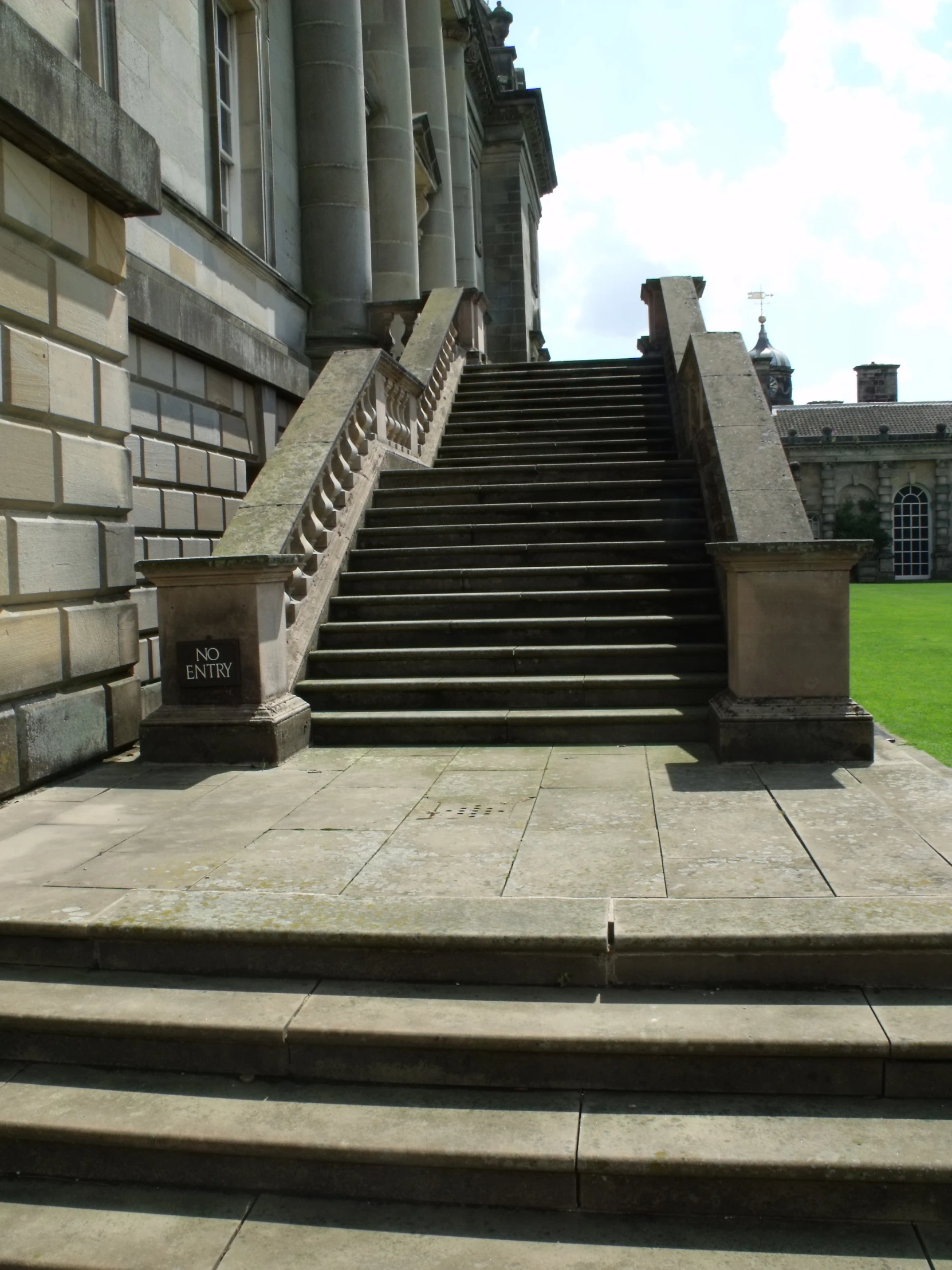 a large group of steps are shown in front of a building