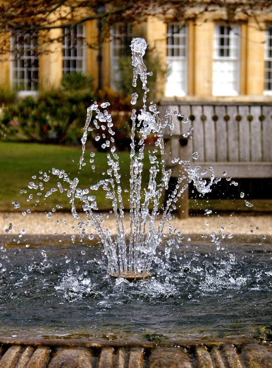 a water fountain with water shooting out of it