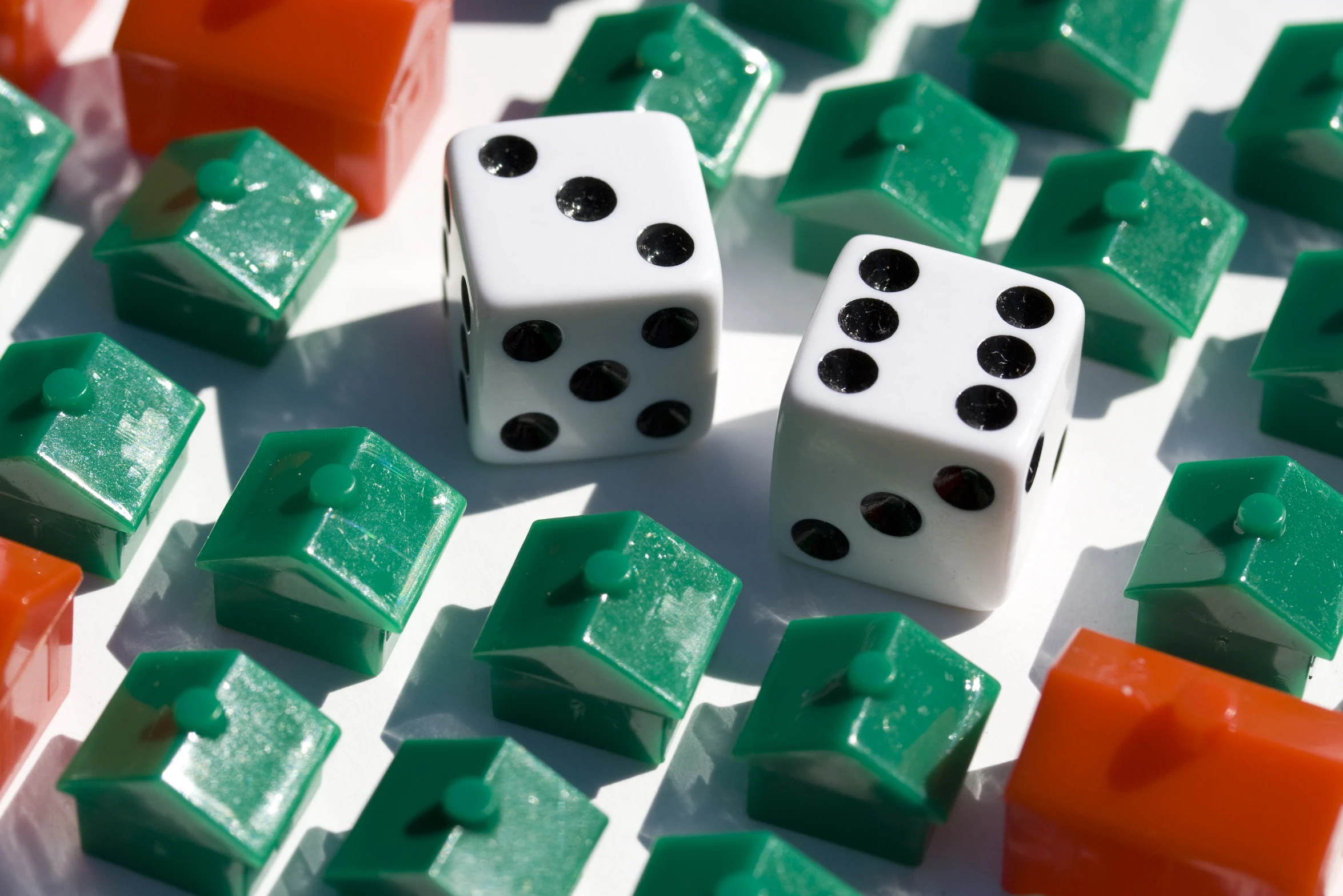 dices with orange and green blocks next to them