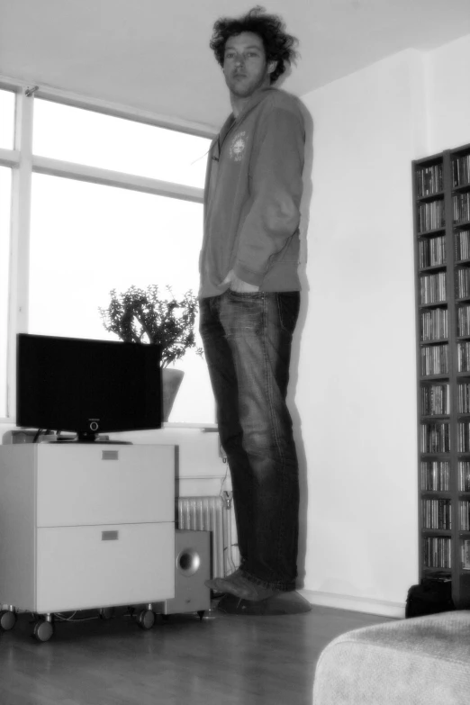 a man standing in the middle of the room