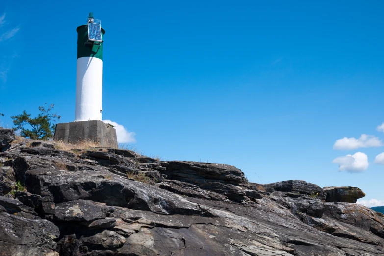 a light house on top of a cliff