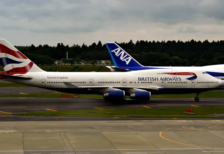 a large jumbo jet on an airport runway