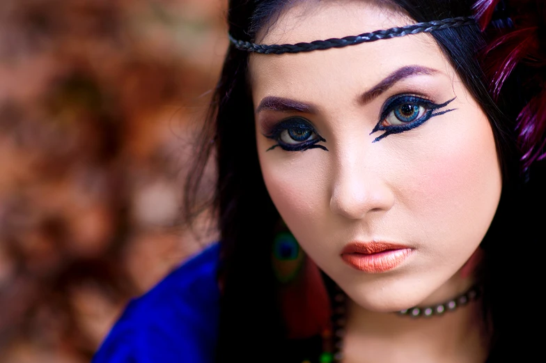 closeup of an attractive lady with feathers on her head