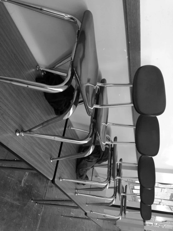 black and white pograph of chairs in a row