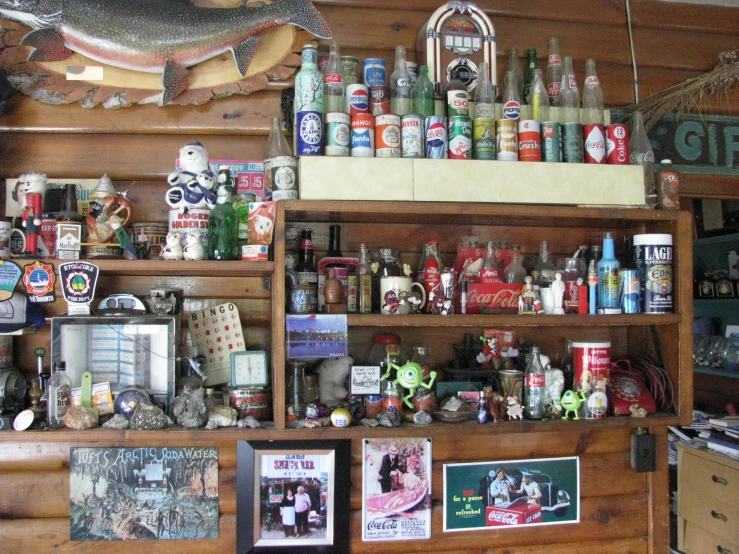 a store counter full of assorted bottles and pictures