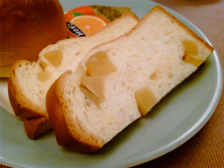 a white plate topped with slices of bread