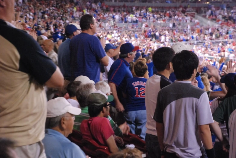 a bunch of people are in a stadium together