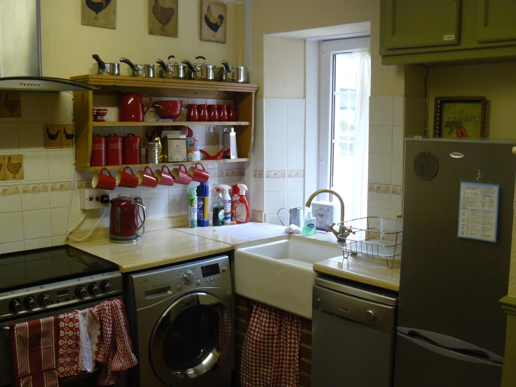 a kitchen with a sink and dish rack