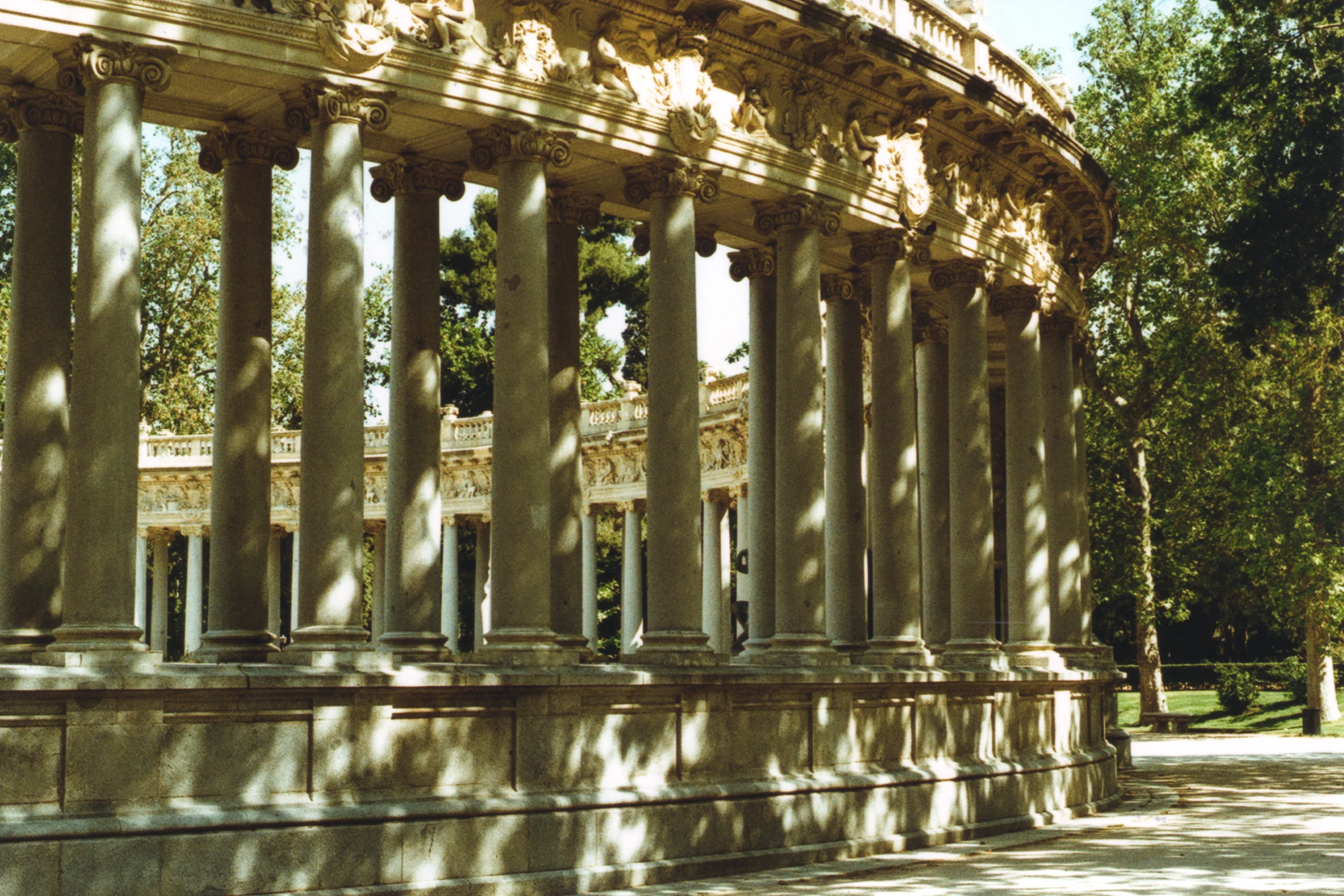 many columns at the end of an outdoor courtyard