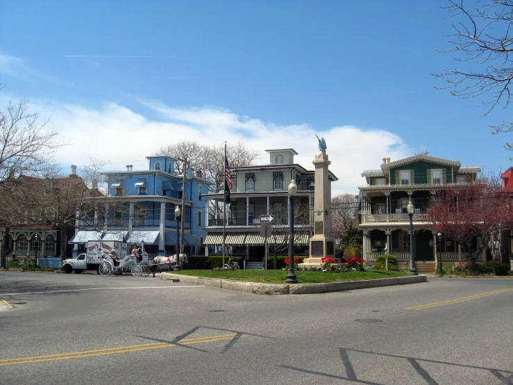 a large row of colorful buildings next to each other