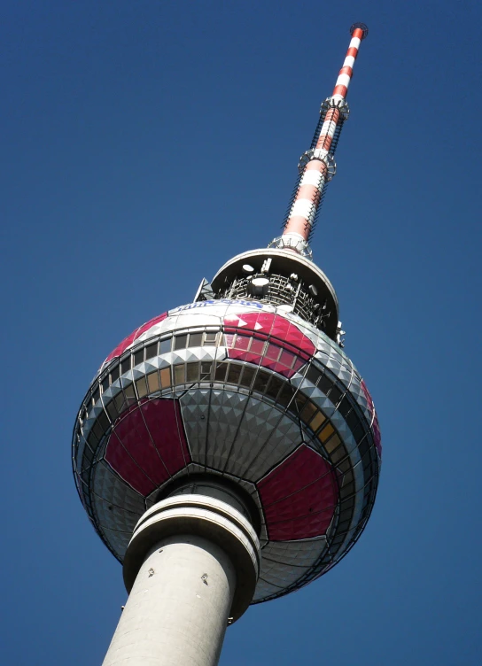 the television tower that has a very colorful roof