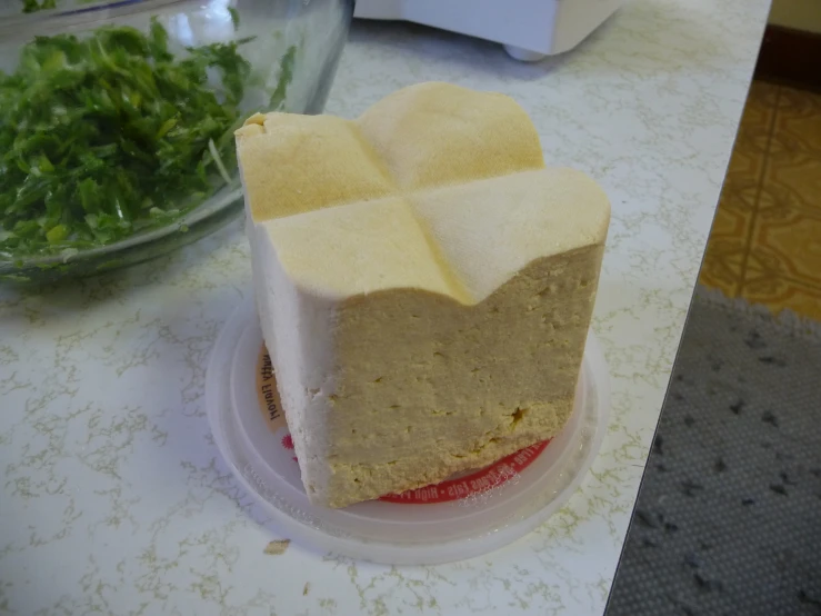 there is a cake with square shaped pieces on it
