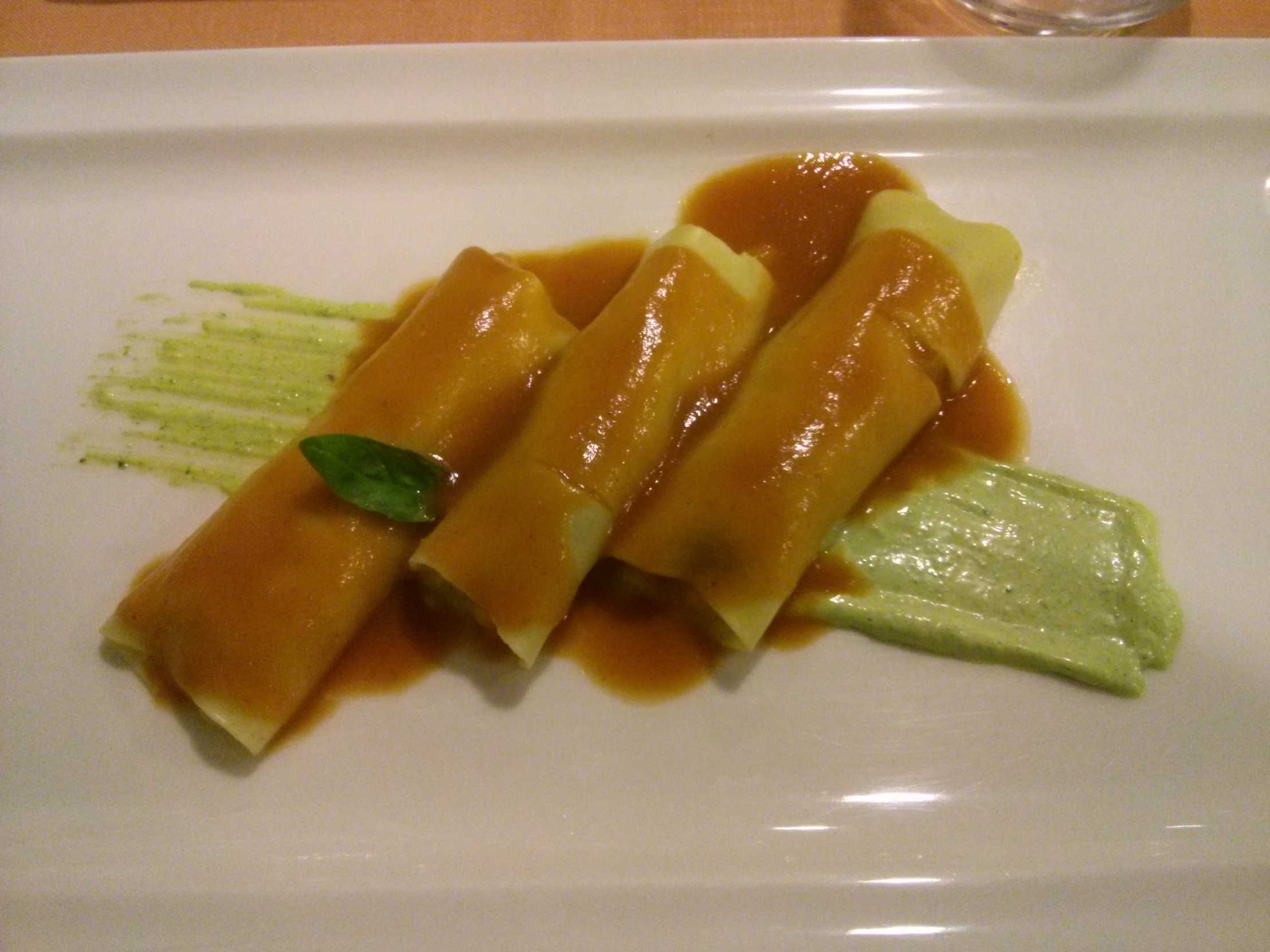 an assortment of snacks served on a square white plate