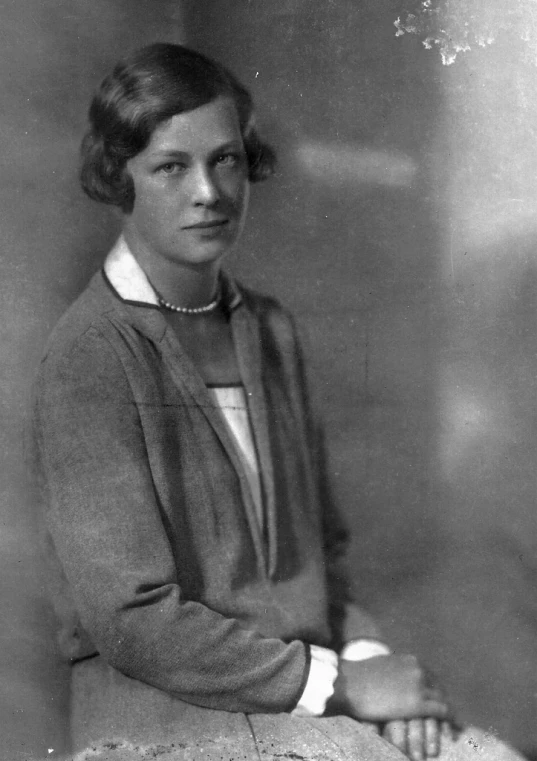 black and white portrait of a woman with collar