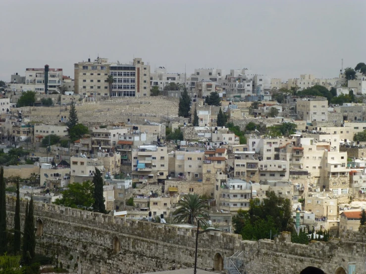 a large city skyline is seen from the other side