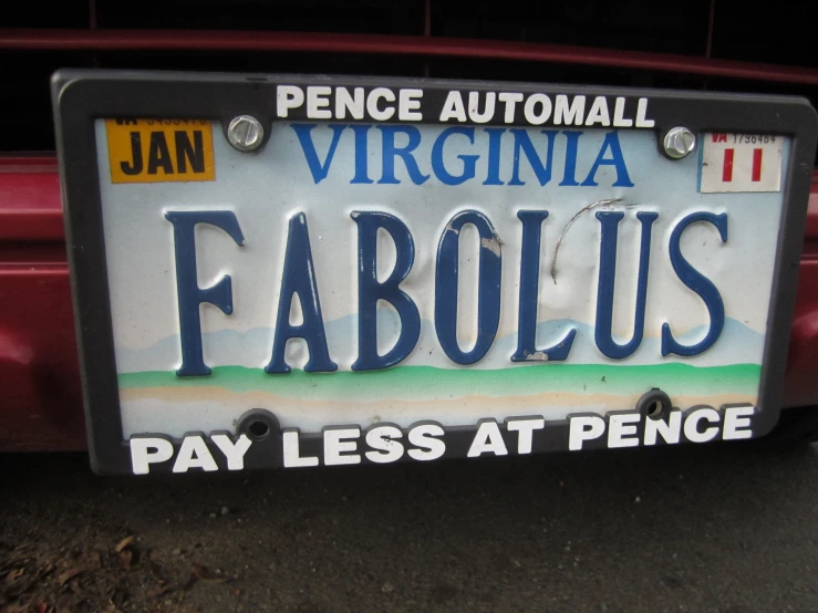 a license plate for a company that sells antiques