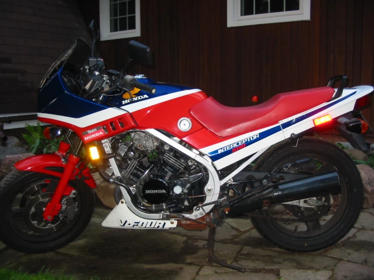 a motorcycle parked outside of a building