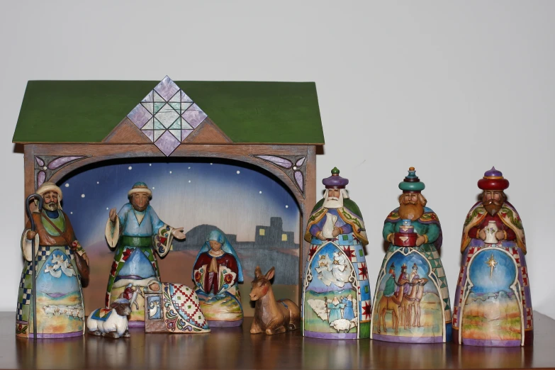 there are some christmas figurines that are on display