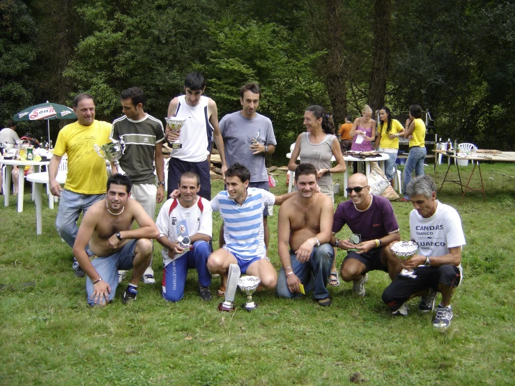 several people with s at an outside gathering