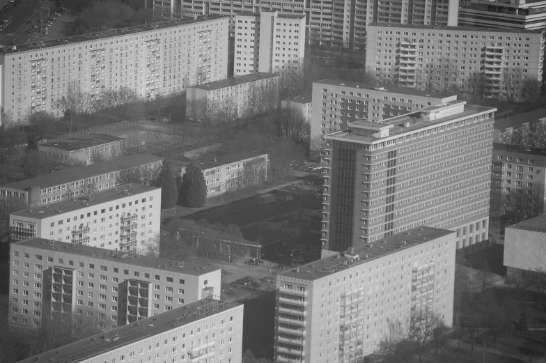 some large buildings in the city, and a black and white po