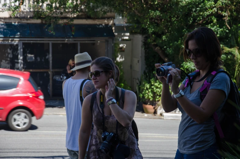 a group of people standing in front of a building