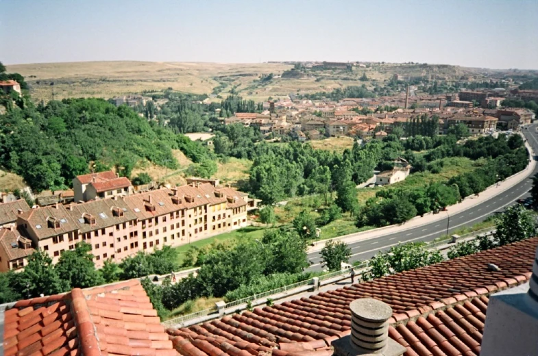 the red tiles of a roof in an urban area