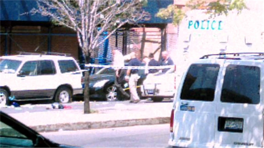 a police car that is parked in front of a building