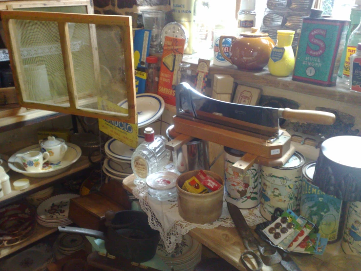 a counter in a shop filled with lots of items