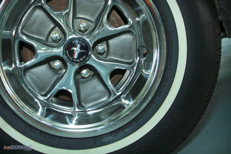 the spokes and center caps of a car wheel