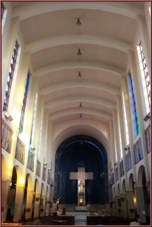 the large cathedral has an arch at the end