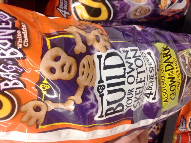 a bag of weird looking snacks on display in a store