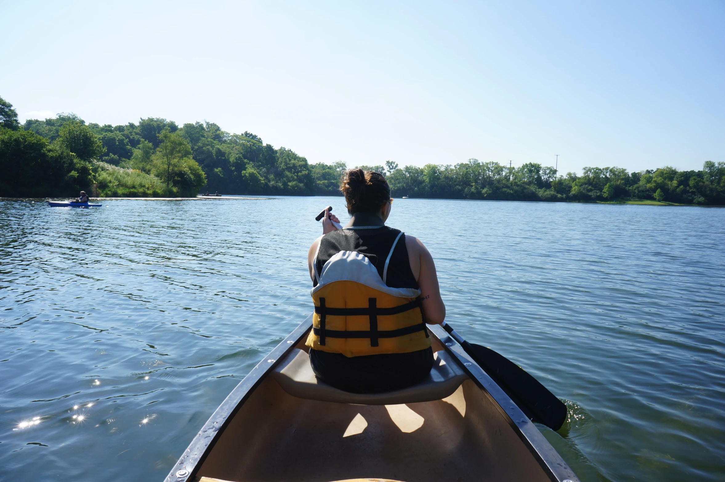 there is a man kayaking in the water