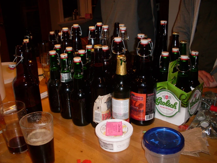 bottles of beer and other alcohol sit on the table
