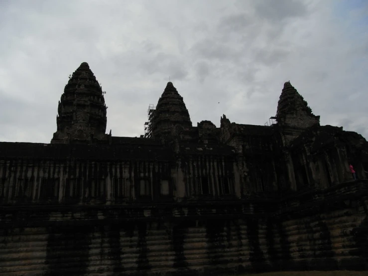 a gothic architecture against a grey sky