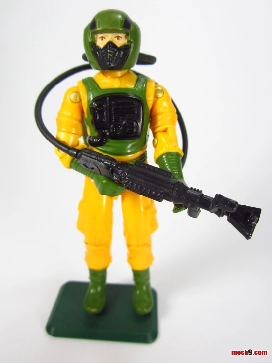 the green and yellow soldier with a gun