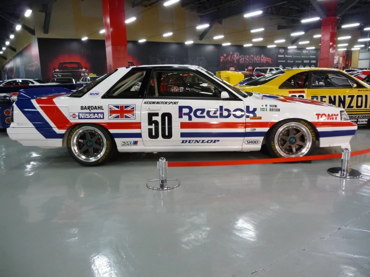 an automobile sits on display at the auto show