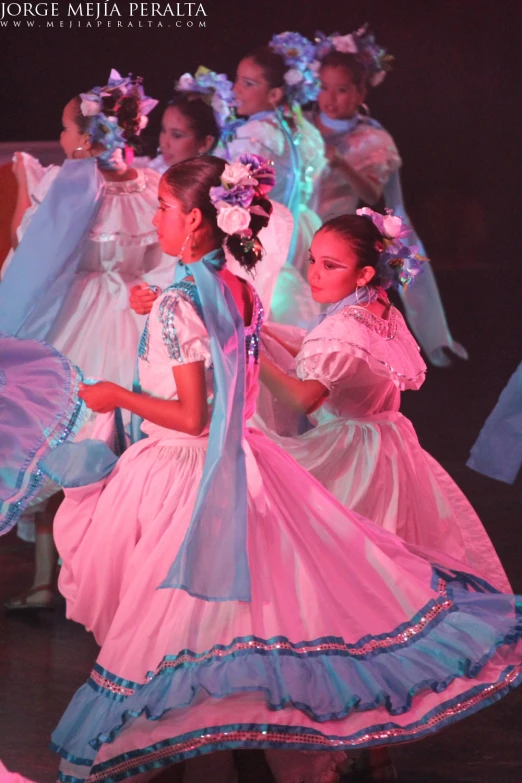 children in fancy dresses at the ballet