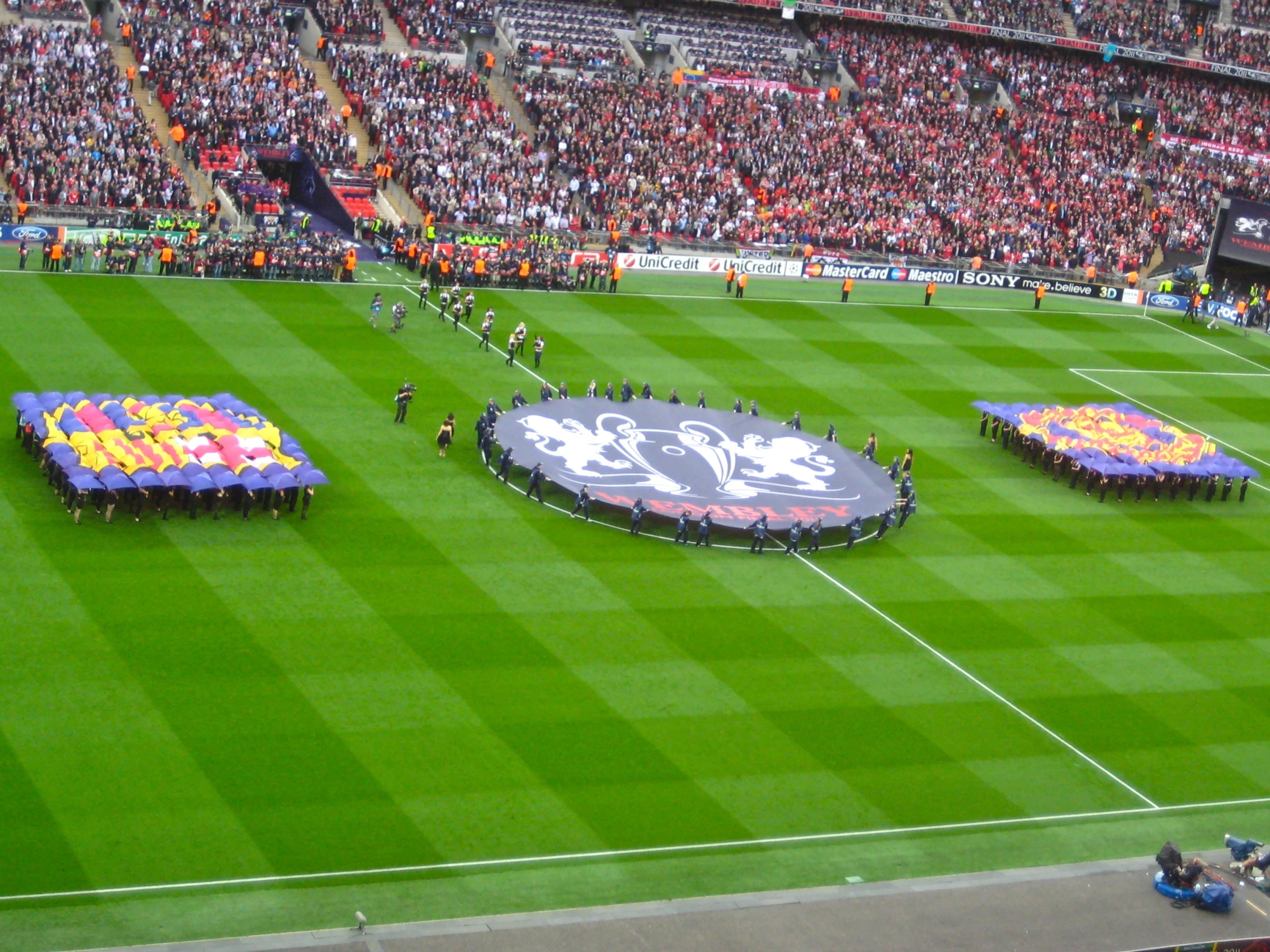 many large banners are laid out on a field