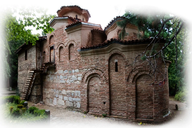 there is a large brick building with a clock tower