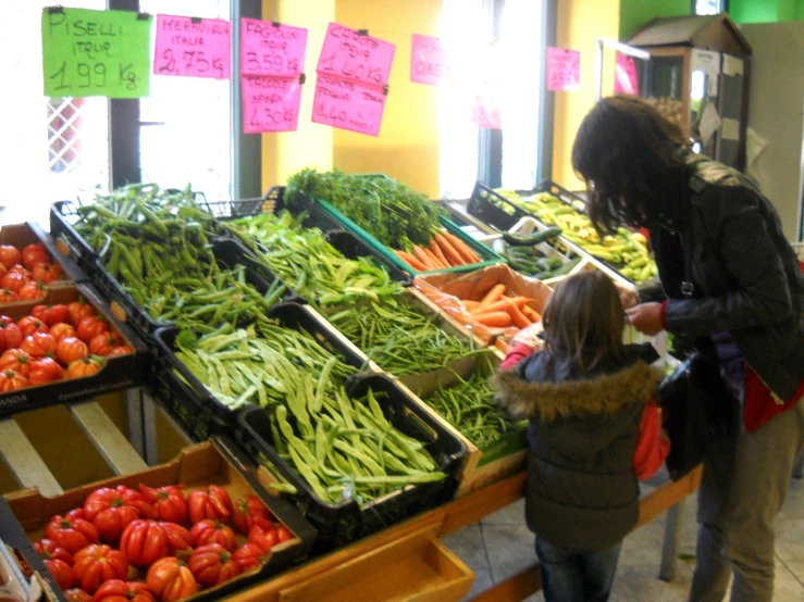 there are a lot of vegetables on display