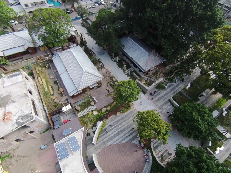 an aerial view of a town with a lot of traffic