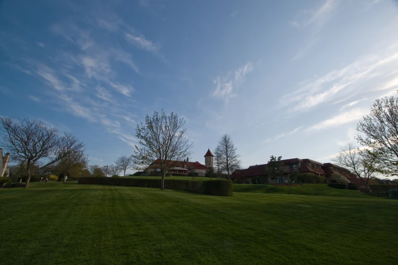 the back yard of a large estate is empty